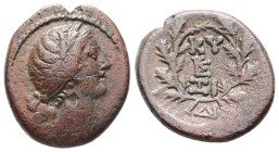 Mysia, Kyzikos. Ae, 5.40 g 20.42 mm. 2nd-1st centuries BC. 
Obv: Head of Kore to right, wearing wreath of corn 
Rev: ΚΥ-ΣΙ above and below monogram wi...