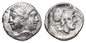 Mysia, Lampsakos. AR Diobol, 1.25 g 11.19 mm. 4th-3rd centuries BC.
Obv: Janiform female head, dolphin to left on neck.
Rev: ΛΑΜΨ, Helmeted head of At...