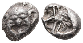 Mysia, Parion. AR Drachm, 3.89 g. – 14,36 mm. 5th century BC.
Obv.: Facing gorgoneion with protruding tongue.
Rev.: Disorganized linear pattern within...
