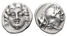 Pisidia, Selge. AR Obol, 0.75 g 10.49 mm. Circa 350-300 BC.
Obv: Facing gorgoneion.
Rev: Helmeted head of Athena right; astragalos to left.
Ref: SNG B...