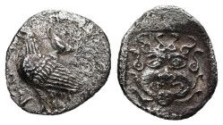 Troas, Abydos. AR, Obol. 0.67 g. - 12.18 mm. Circa 480-450 BC.
Obv.: ABY. Eagle standing left, kantharos to right.
Rev.: Facing gorgoneion, with tongu...