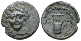 Troas, Alexandreia. Ae, 3.25 g 18.67 mm. Circa 164-135 BC. 
Obv: Facing laureate head of Apollo. 
Rev: A - ΛE / ΞA - N. Lyre; all within laurel wreath...
