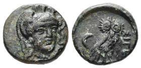 Troas, Sigeion. AE. 1.75 g. - 13.10 mm. 355-334 BC.
Obv.: Helmeted head of Athena facing slightly right.
Rev.: ΣΙΓΕ. Owl standing right, head facing; ...