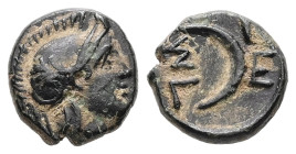 Troas, Sigeion. Ae, 1.01 g. - 9.46 mm. 4th-3rd centuries BC.
Obv.: Helmeted head of Athena right.
Rev.: Σ - Ι / Γ - Ε, Crescent left within linear squ...
