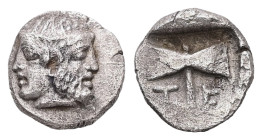 Troas, Tenedos. AR Hemiobol, 0.55 g. - 8.21 mm. Circa 450-387 BC.
Obv.: Janiform female and male heads,.
Rev.: T-E, Double axe.
Ref.: SNG Arikanturk 8...