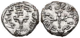 Judaea, The Jewish War. AR 1/2 Shekel, 6.84 g 19.00 mm. 66-70 CE. Jerusalem, year 1 (66/7 CE). 'Half of a shekel' (Paleo-Hebrew)
Obv: Ritual chalice ...