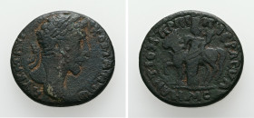 Syria, Decapolis. Antiochia ad Hippum. Commodus, AD 177-192. AE. 8.60 g. 24.92 mm.
Obv: ΑΥΤ Κ Μ ΑΥΡ ΚΟΜ ΑΝΤω. Laureate head of Commodus, right.
Rev: Α...