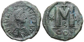 Anastasius, AD 491-518. AE, Follis. 18.52 g. 33.23 mm. Constantinople.
Rev: DNANASTA-SIVSPPAV. Bust of Anastasius I facing right with diadem, cuirass,...