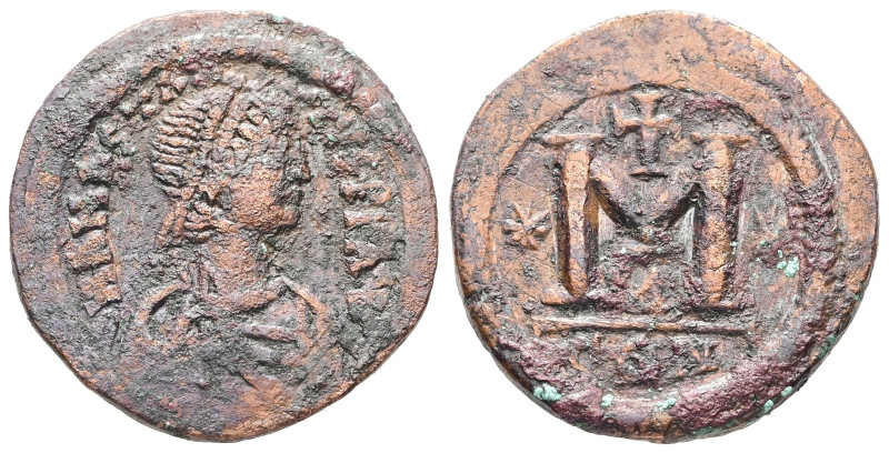 Anastasius, AD 491-518. AE, Follis. 8.96 g. 25.66 mm. Constantinople.
Rev: DNANA...