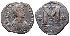 Justin I, AD 518-527. AE, Follis. 16.94 g. 30.79 mm. Constantinople.
Obv: DN IVSTI-NVS P AVC. Pearl diademed, draped, cuirassed bust right.
Rev: Large...