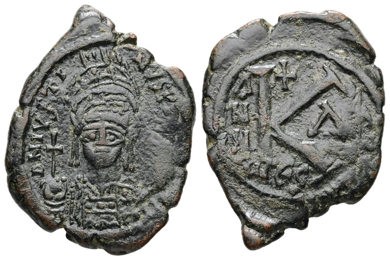 Justin I, AD 518-527 or Justinian I, AD 527-565. AE, Half Follis. 6.30 g. 29.68 ...