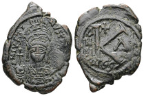 Justin I, AD 518-527 or Justinian I, AD 527-565. AE, Half Follis. 6.30 g. 29.68 mm. Thessalonica.
Obv: D N IVSTI[…]NVS P P AVG. Helmeted and cuirassed...