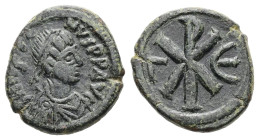 Justin I, AD 518-527. AE, Pentanummium. 2.13 g. 14.23 mm. Constantinople.
Obv: DN IVSTINVS PP AV. Pearl diademed, draped, cuirassed bust of Justin to ...