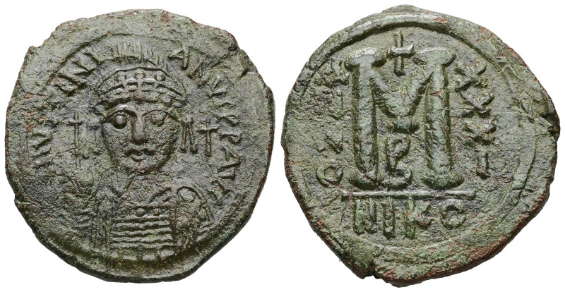 Justinian I, AD 527-565. AE, Follis. 16.10 g. 32.89 mm. Nicomedia.
Obv: DNIVSTIN...