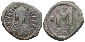 Justinian I, AD 527-565. AE, Follis. 16.84 g. 32.79 mm. Constantinople.
Obv: DNIVSTINI-ANVSPPAVC. Bust of Justinian I facing right with diadem, cuiras...