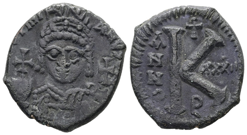 Justinian I, AD 527-565. AE, Half Follis. 9.67 g. 25.76 mm. Theoupolis (Antioch)...