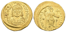 Justin II, AD 565-578. AV, Solidus. 4.50 g. 20.14 mm. Constantinople.
Obv: DNI-VSTI-NVSPPAVC. Frontal bust of Justin II with shield and cuirass and w...