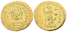 Justin II, AD 565-578. AV, Solidus. 4.50 g. 20.96 mm. Constantinople.
Obv: [DNI]-VSTI-NVSPPAVC. Frontal bust of Justin II with shield and cuirass and ...