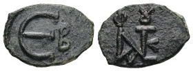 Justin II, AD 565-578. AE, Pentanummium. 1.04 g. 16.03 mm. Constantinople.
Obv: IΥΣTINAI KAI ΣO ΦIAΣ. Monogram of Justin II and Sophia.
Rev: Large Є; ...