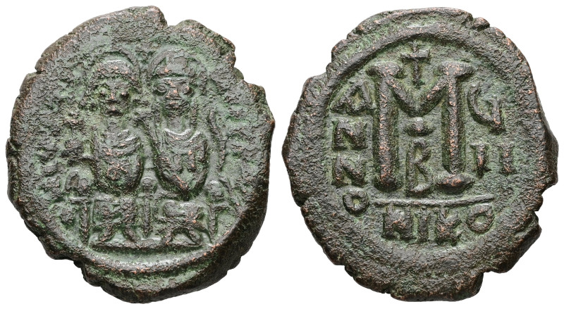 Justin II and Sophia. AD 565-578. AE, Follis. 13.10 g. 29.82 mm. Nicomedia.
Obv:...