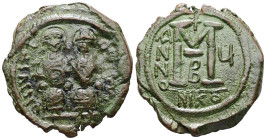 Justin II and Sophia. AD 565-578. AE, Follis. 14.48 g. 33.21 mm. Nicomedia. 
Obv: DNIVSTI-NVSPPAVC. Justin II on left and Sophia on right, seated, nim...
