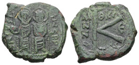 Justin II and Sophia, AD 565-578. AE, Half Follis. 6.12 g. 22.99 mm. Thessalonica.
Obv: DNIVSTI-NVSPPAV. Justin II on left and Sophia on right, seated...