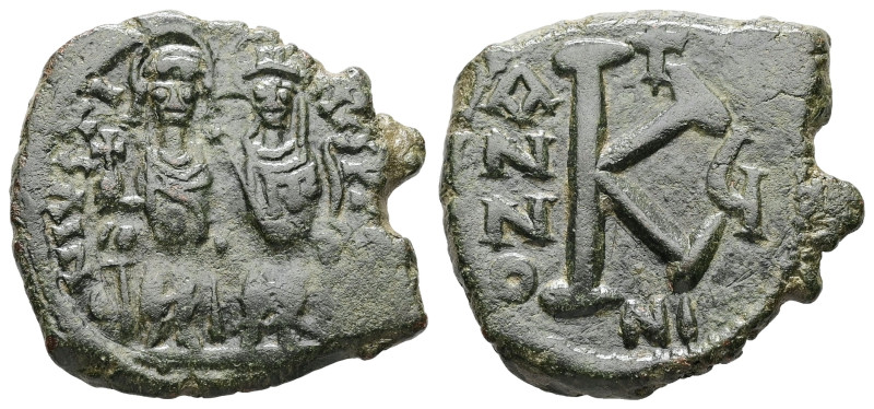 Justin II and Sophia, AD 565-578. AE, Half Follis. 6.80 g. 26.29 mm. Nicomedia.
...