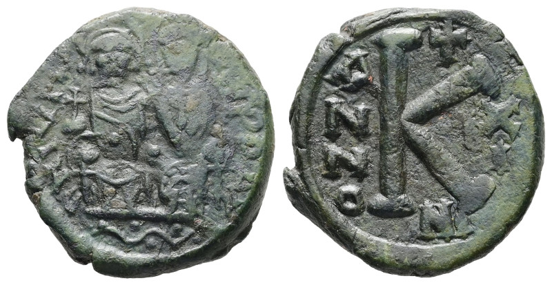 Justin II and Sophia, AD 565-578. AE, Half Follis. 5.86 g. 21.34 mm. Nicomedia.
...