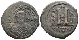 Maurice Tiberius, AD 582-602. AE, Follis. 11.04 g. 29.51 mm. Theoupolis (Antioch).
Obv: D N MAVΓI- CNPAVT. Frontal bust of Maurice wearing loros and c...