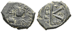 Maurice Tiberius, AD 582-602. AE, Half Follis. 6.32 g. 23.04 mm. Thessalonica.
Obv: D N mAV TIЬЄR P P AV. Crowned and cuirassed bust facing, holding g...