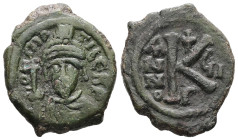 Maurice Tiberius, AD 582-602. AE, Half Follis. 5.67 g. 23.95 mm. Constantinople. 
Obv: D N MA TIBE PP. Crowned, draped and cuirassed bust facing, hold...