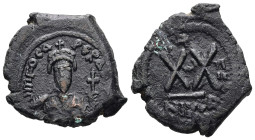 Phocas, AD 602-610. AE, Half Follis. 6.32 g. 25.27 mm. Nicomedia.
Obv: Frontal bust of Phocas wearing consular robes and crown with cross.
Rev: XX wit...