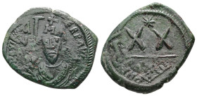 Phocas, AD 602-610. AE, Half Follis. 5.70 g. 26.01 mm. Constantinople (?).
Obv: Frontal bust of Phocas wearing consular robes and crown with cross.
Re...