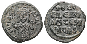 Theophilus, AD 829-842. AE, Follis. 5.00 g. 22.95 mm. Constantinople.
Obv: ΘEOFIL-bASIL. Crowned, three-quarter length figure of Theophilus facing, pe...