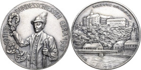 Reuss-Städte und Gemeinden
Gera Silbermedaille 1931 (O.L.G.) 29. Thüringisches Bundesschießen. Schütze mit Gewehr und erhobenem Kranz / Ansicht des S...