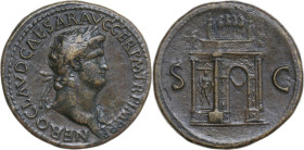 Nero (54-68). AE Sestertius, 64 AD. Obv. NERO CLAVD CAESAR AVG GER P M TR P IMP P P. Laureate head right, wearing aegis. Rev. S C. View of triumphal a...