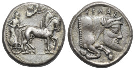 Sicily. Gela. Circa 490-475 BC. Tetradrachm (Silver, 25.07 mm, 17.19 g). Charioteer driving slow biga right, holding kentron and reins; Nike flying ab...