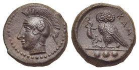 Sicily. Kamarina. Circa 420-405 BC. Tetras (Bronze, 14.81 mm, 3.46 g). Head of Athena to left, wearing crested Attic helmet decorated with a wing. Rev...
