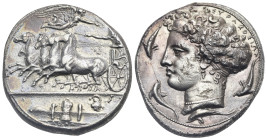 Sicily. Syracuse, Dionysios I. Circa 407-400 BC. Dekadrachm (Silver, 35.21 mm, 42.74 g). Charioteer driving fast quadriga left, holding kentron and re...