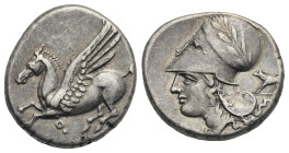 Corinthia. Corinth. Circa 375-300 BC. Stater (Silver, 20.82 mm, 8.52 g). Pegasus landing left; koppa below. Rev. Helmeted head of Athena left, helmet ...