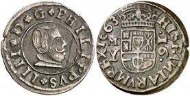 1663. Felipe IV. M (Madrid). Y. 16 maravedís. (Cal. 1402) (J.S. M-406). 4,28 g. Tres puntos sobre el busto. MBC-/MBC.
