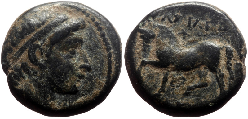 Kings of Thrace, Mostidos AE (Bronze, 4.00g, 14mm) ca 125-85/79 BC
Obv: Laureate...