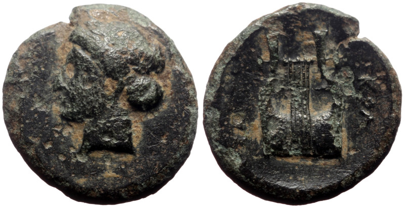 Ionia, Kolophon AE (Bronze, 1.80g, 14mm) ca 400-350 BC 
Obv: Laureate head of Ap...