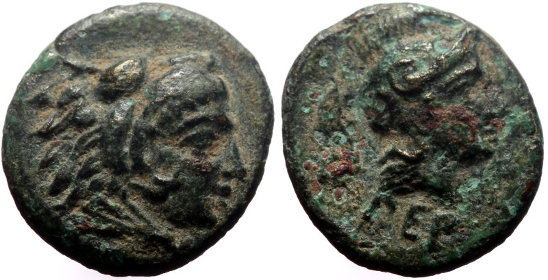 Mysia, Pergamon AE (Bronze, 1.03g, 11mm) ca 310-282 BC. 
Obv: Head of Herakles t...