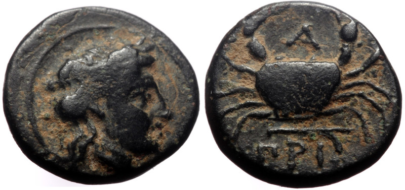 Mysia, Priapos AE (Bronze, 1.39g, 11mm) 4th century BC. 
Obv: Laureate head of A...