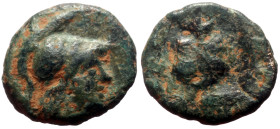 Pamphylia, Side AE (Bronze, 0.90g, 11mm) 300-200 BC. 
Obv: Head of Athena to right, wearing crested Corinthian helmet 
Rev: Pomegranate within incuse ...