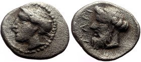 Cilicia, Nagidos AR Obol (Silver, 0.64g, 10mm) ca 420-380 BC. 
Obv: Head of Aphrodite to left 
Rev: Head of Dionysos to right; NAΓI upwards before. 
R...