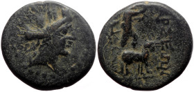 Cilicia, Tarsos AE (Bronze, 3.34g, 15mm) 164-27 BC
Obv: Turreted head of Tyche right.
Rev: TAPCЄΩN, Sandan standing right on goat right. Monogram in l...