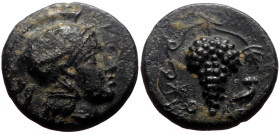 Cilicia, Soloi AE (Bronze, 1.88g, 13mm) ca 4th century BC Æ
Obv: Helmeted head of Athena right 
Rev: Grape bunch; star to left, owl to right. 
Ref: SN...