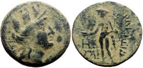Cilicia, Korykos AE (Bronze, 6.77g, 22mm) 1st century BC
Obv: Turreted head of Tyche right; AT to left 
Rev: Hermes standing left, holding phiale and ...